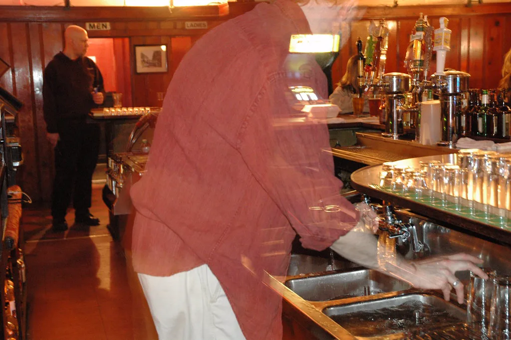A bartender working the rail at Rainbo Club