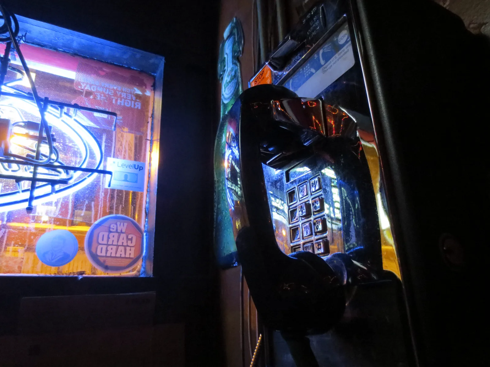 A pay phone inside Rossi's Liquors