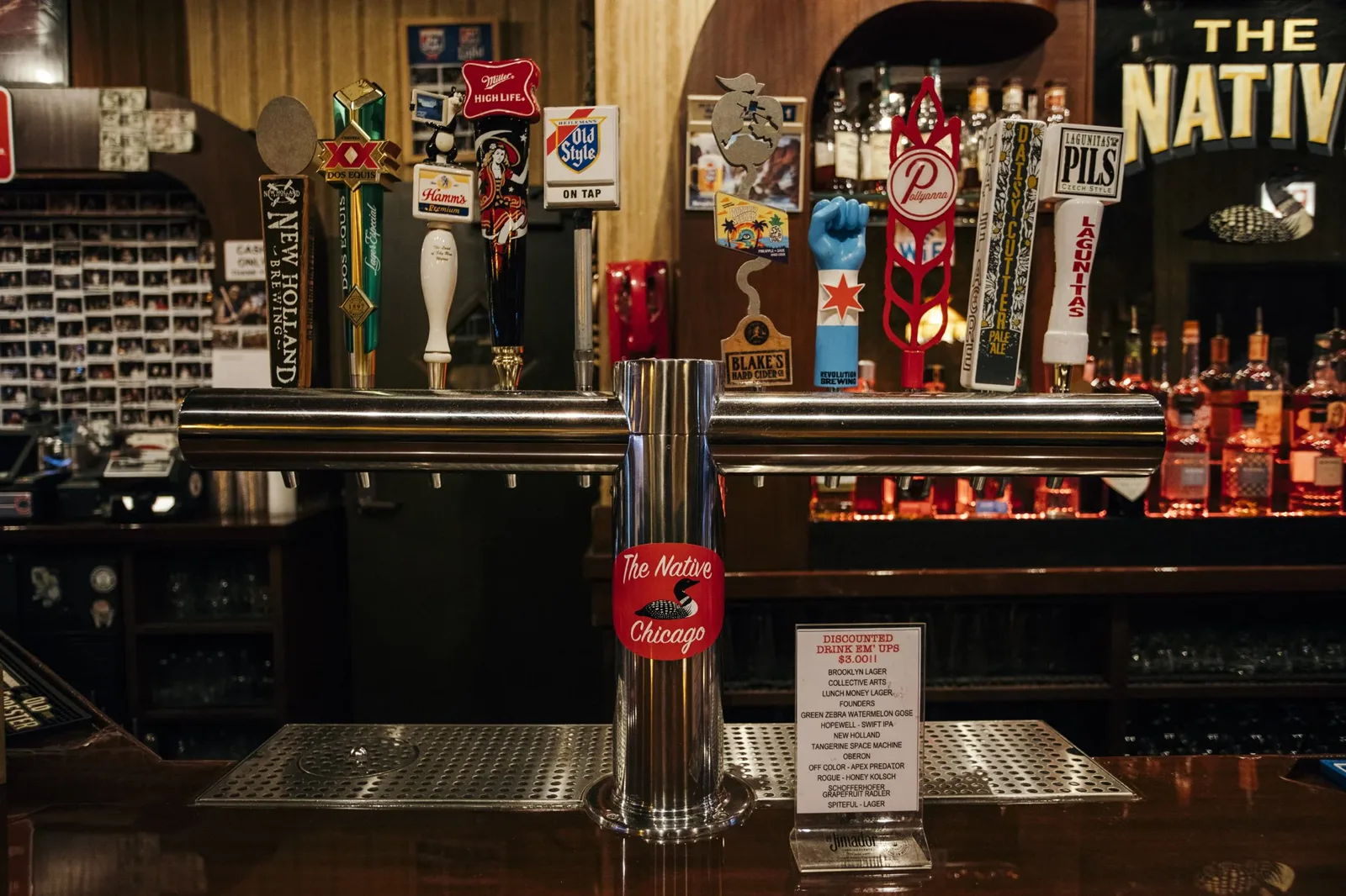 The Native Chicago tap tower, Old Style handle, and discounted-drink chalkboard
